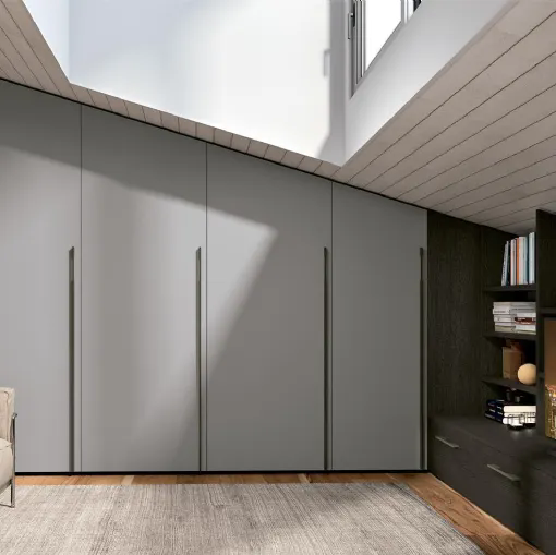 Armadio mansardato in melaminico con zona giorno Composizione 15 di Ferrimobili