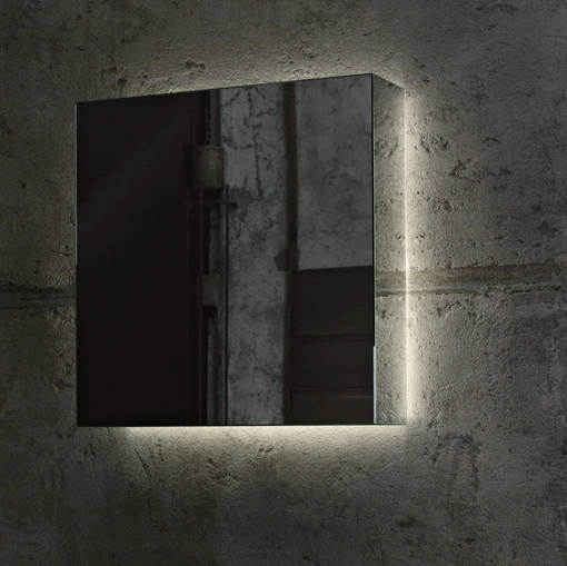 Specchio parallelepipedo realizzato incollando lastre di specchio bisellato I Massi di Glas Italia