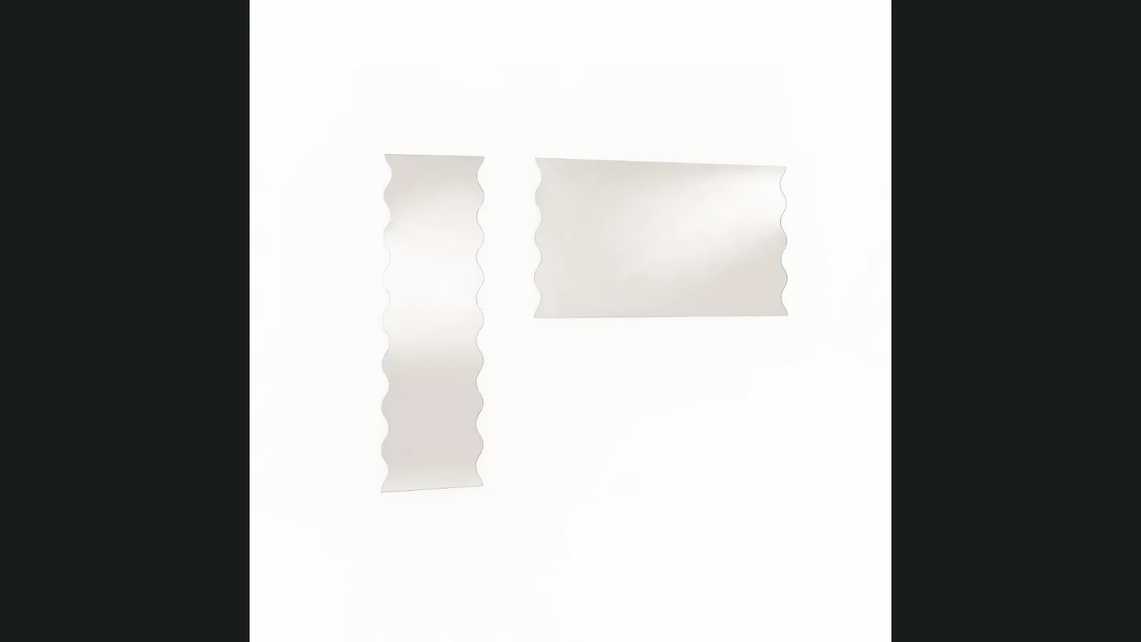 Specchi Onda con bordi ondulati di Glas Italia