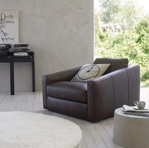 Poltrona in pelle dalla seduta morbida e profonda Tobias di Estel