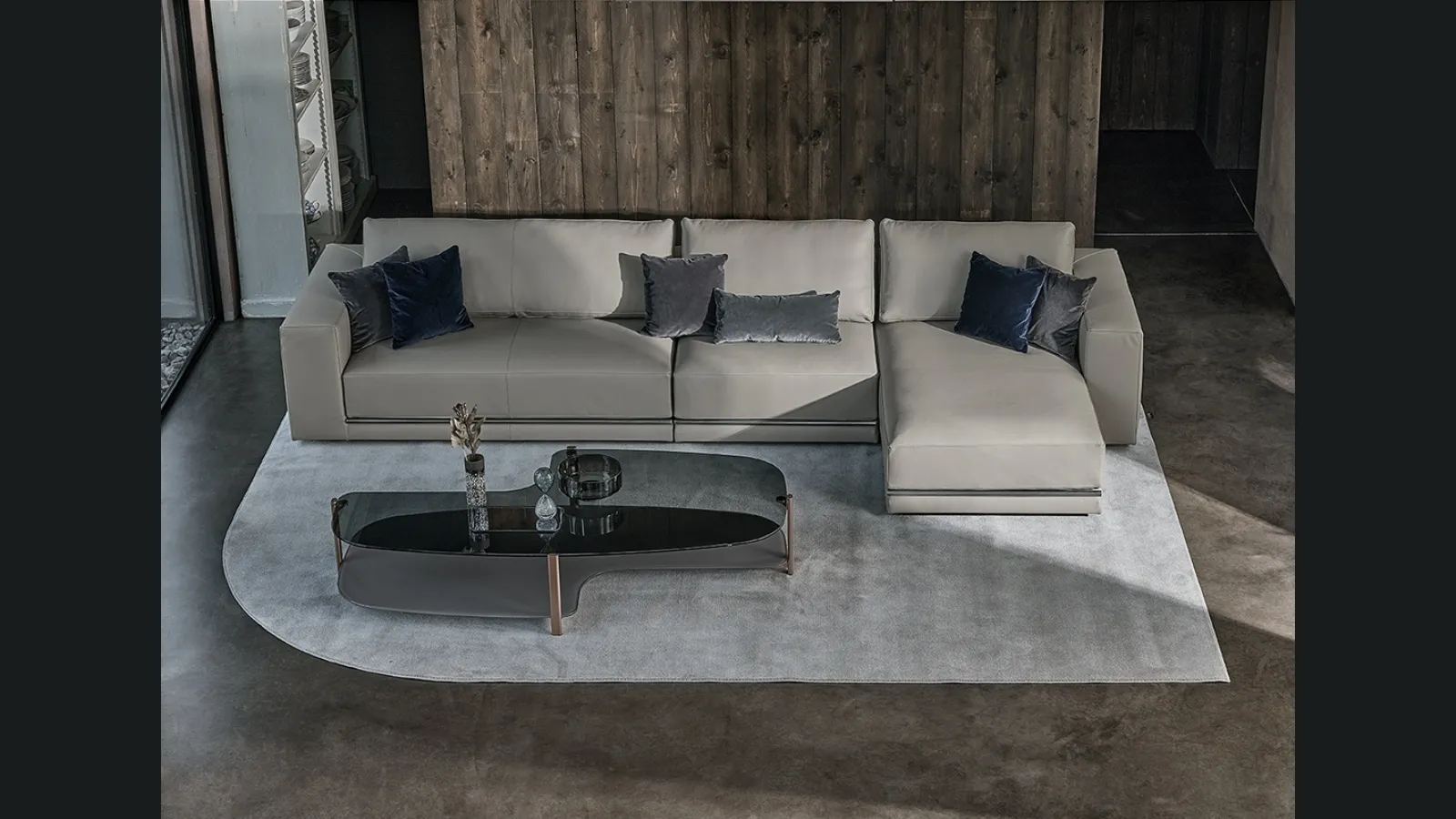 Divano in pelle con penisola Pitagora di Bontempi