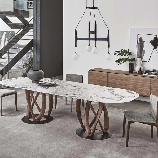 Tavolo ovale con piano in marmo e base in legno massello Infinity di Porada