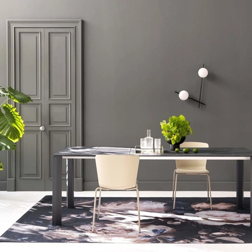 Tavolo allungabile Petalo con top in HPL Ardesia e base in alluminio Sedie Brianza