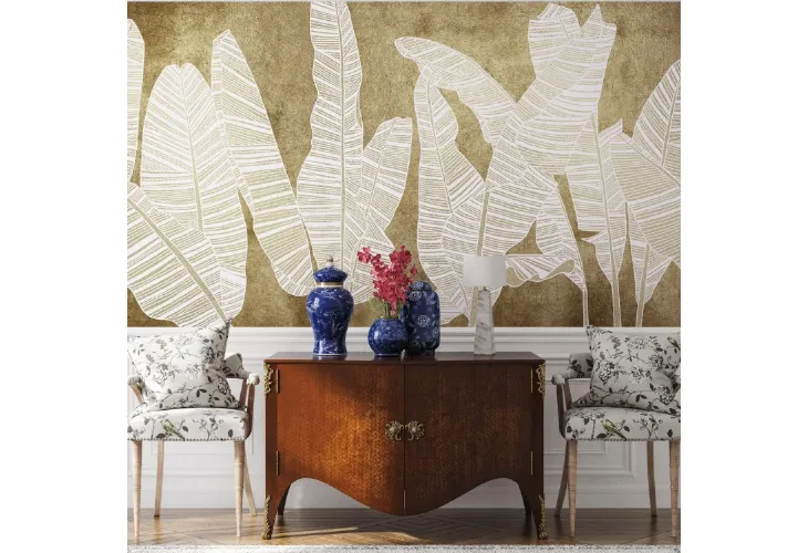 Carta da parati con grandi foglie su sfondo metallico Copacabana Metallics di Larsen