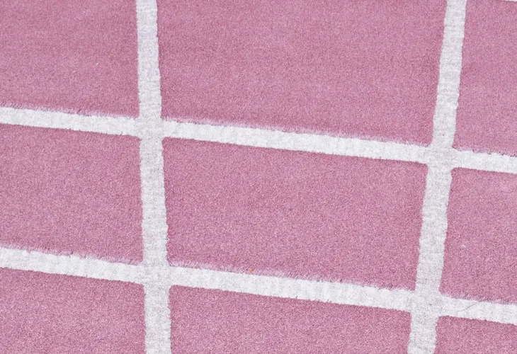 Tappeto rotondo rosa con linee bianche Vivienne di Besana Moquette