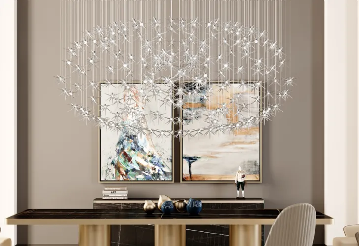 Lampada a sospensione con stelle pendenti in vetro borosilicato soffiato trasparente con led interno Stella di Reflex